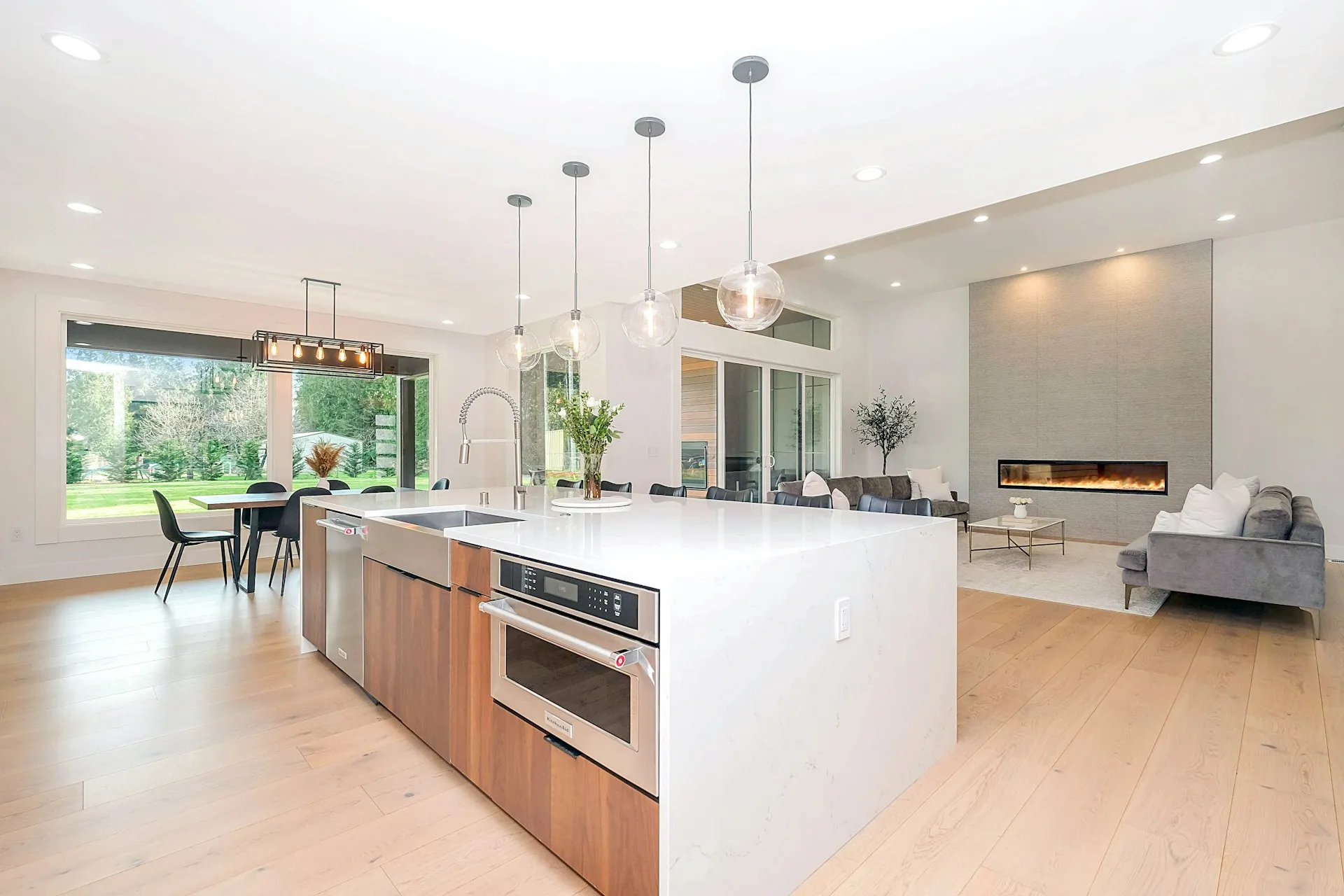 Renovated kitchen with island and stainless appliances